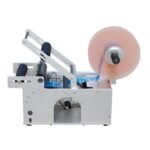 آلة لصق ستيكر للعبوات الدائرية