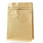 كيس قهوة ذهبي صغير مع فلتر وسير