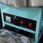 ⁦آلة غزل بنات لون فيروزي⁩ - الصورة ⁦2⁩